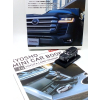 Toyota Land Cruiser ZX 2021 gray (with Japanese book) - skala 1:64 - Kyosho